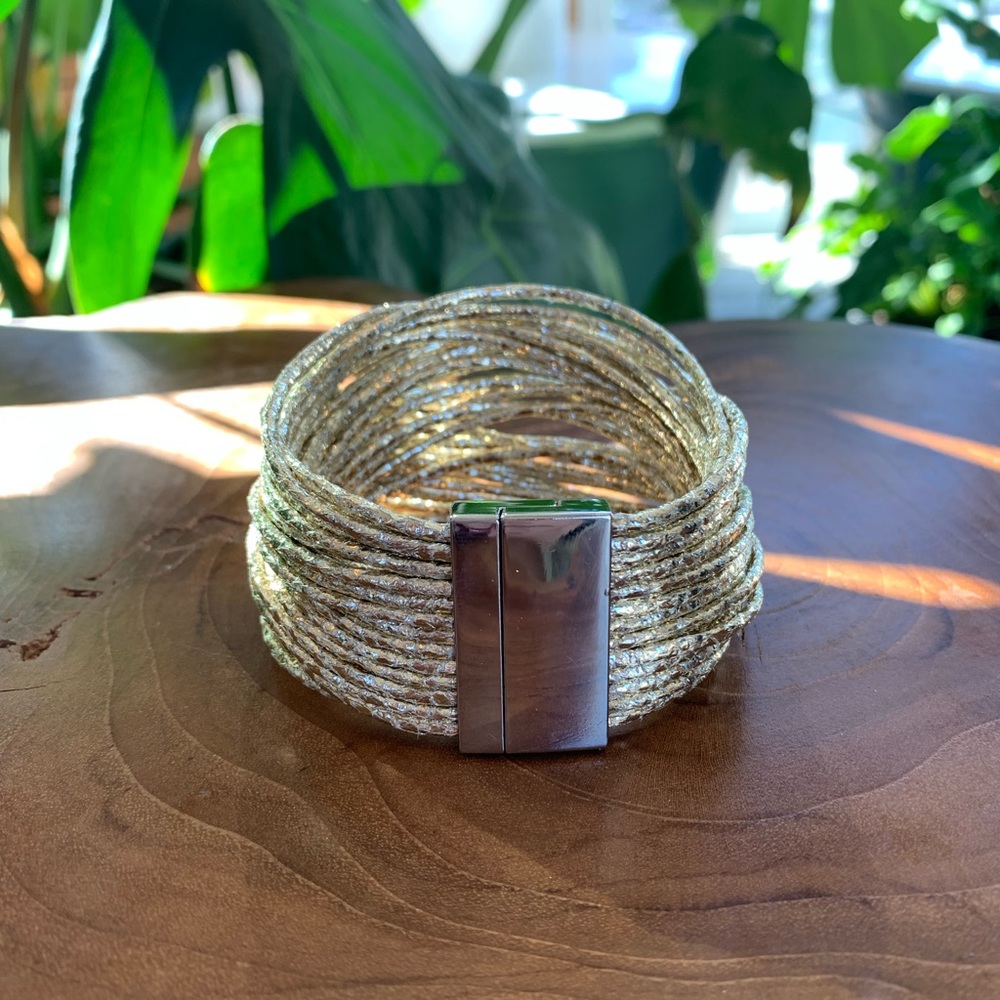 Gold twisted pleather bangle bracelet